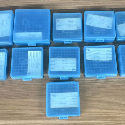 A Collection of Dillon Precision Blue Plastic Ammunition Storage Cases