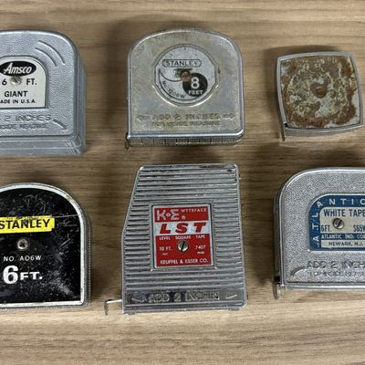 A Collection of Vintage American Steel Pocket Tape Measures Including Stanley and Keuffel and Esser