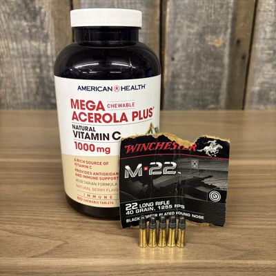 A Group of Winchester M-22 22 Long Rifle Ammunition Housed in a Repurposed Container