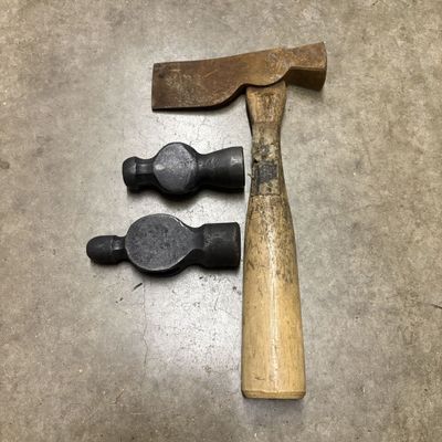 A Group of Forged Steel Tool Heads and a Handled Half Hatchet