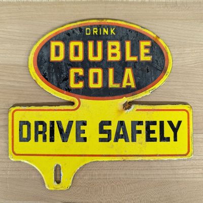 Vintage Enameled Metal Double Cola Drive Safely License Plate Topper
