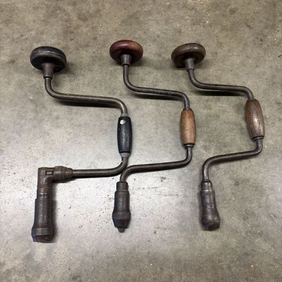 A Trio of Antique Cyclone and Pine Knot Hand Brace Drills