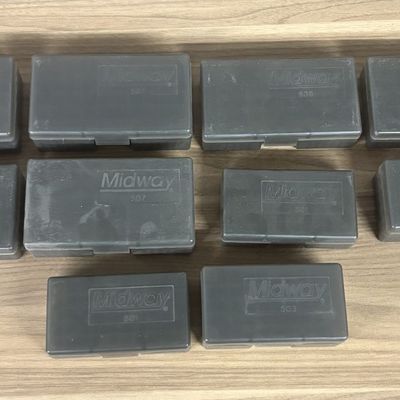 A Collection of Midway Plastic Ammunition Storage Cases