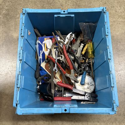 An Assortment of Hand Tools and Household Items in a Blue Peytons Tote