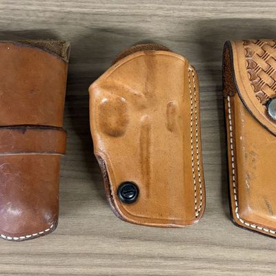 Three Vintage Leather Handgun Holsters and Magazine Pouch