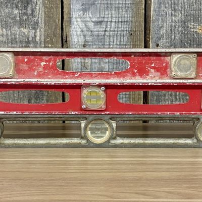 A Group of Three Vintage Belknap, Blue Grass, and Cast Metal Carpenter Levels