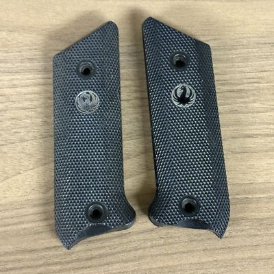 Two Pairs of Checkered Black Polymer Handgun Grip Panels with Silver Tone Eagle Medallions
