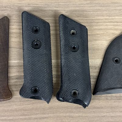 An Assortment of Checkered Handgun Grip Panels