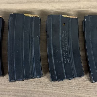 A Collection of Sturm Ruger and Co Inc Mini-14 Steel Magazines with .223 Remington Ammunition
