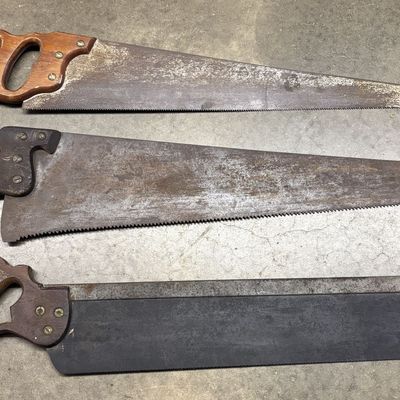 A Trio of Vintage Hand Saws Including Disston and Belknap Blue Grass Examples