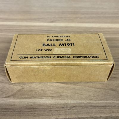 A Box of Fifty Olin Mathieson Chemical Corporation .45 Caliber M1911 Ball Cartridges