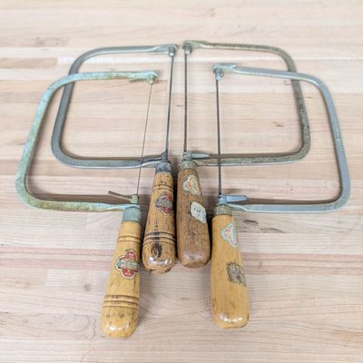 A Collection of Vintage Blue Grass Coping Saws