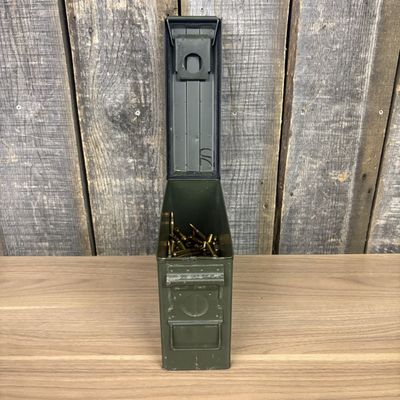 An Assortment of FNM 5.56x45mm NATO Centerfire Rifle Cartridges in a US Military M19A1 Ammunition Can
