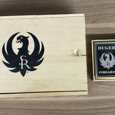 A Ruger Firearms Set of Playing Cards in a Wooden Sliding Lid Box