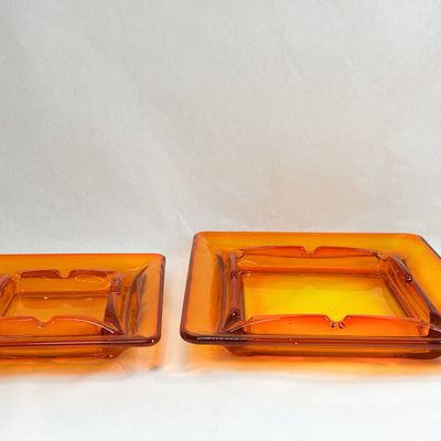 PAIR OF AMBERINA GLASS ASHTRAYS