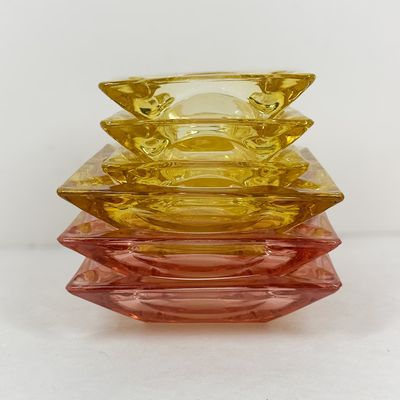 SIX MID-CENTURY PRESSED GLASS ASHTRAYS