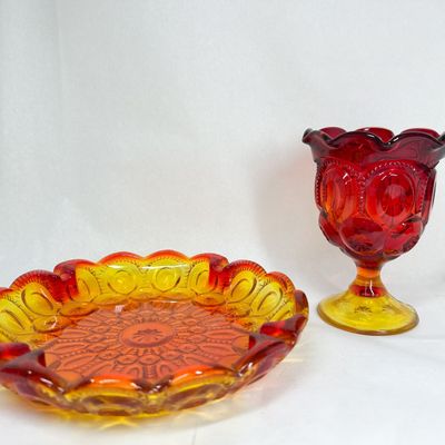 TWO PIECES OF MOON AND STAR AMBERINA GLASS