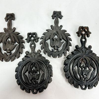 SET OF CAST IRON BIRD TRIVETS