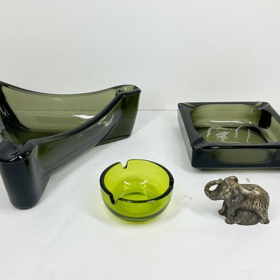 COLLECTION OF GLASS ASHTRAYS AND METAL FIGURINE