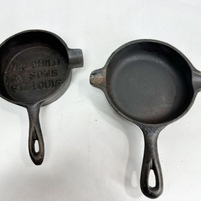 WAGNER WARE AND A.J. CHILD CAST IRON MINIATURE SKILLET ASHTRAYS