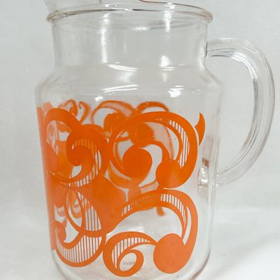 MID-CENTURY ORANGE GRAPHIC GLASS PITCHER