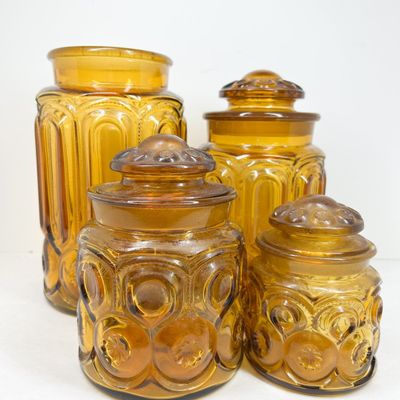 AMBER MOON AND STAR GLASS CANISTERS