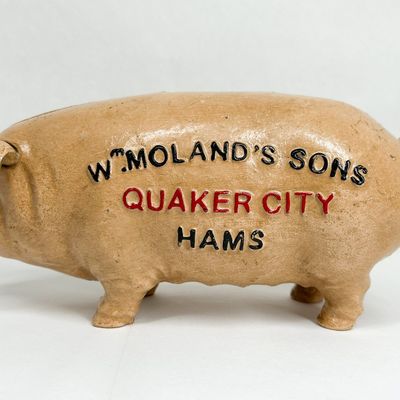WM. MOLAND’S SONS CAST IRON PIG BANK