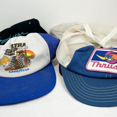 SEVEN VINTAGE ADVERTISING CAPS, 1980S