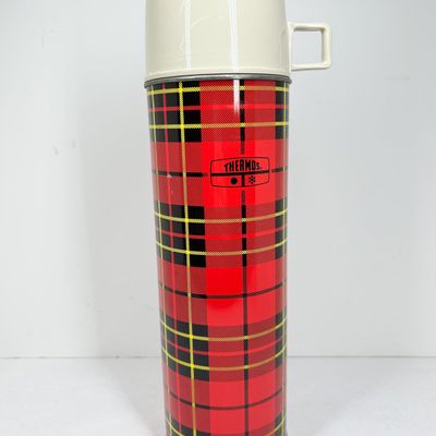 THERMOS RED TARTAN METAL FLASK, CIRCA 1964
