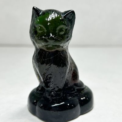 BOYD BLACK SITTING KITTEN ON PILLOW