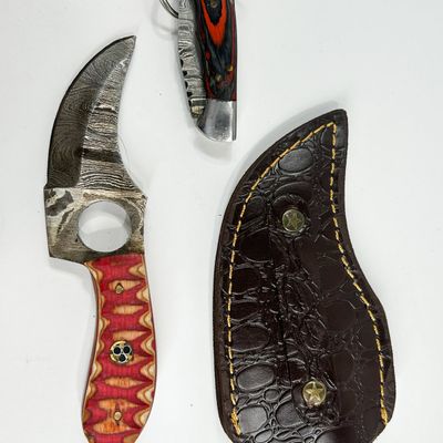 TWO DAMASCUS STEEL KNIVES AND LEATHER SHEATH