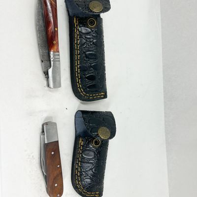 TWO DAMASCUS POCKET KNIVES WITH SHEATHS