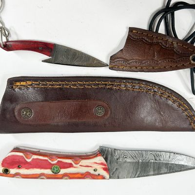 PAIR OF DAMASCUS STEEL KNIVES WITH COLORFUL LAMINATE HANDLES