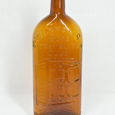 WARNER'S AMBER GLASS MEDICINE BOTTLE
