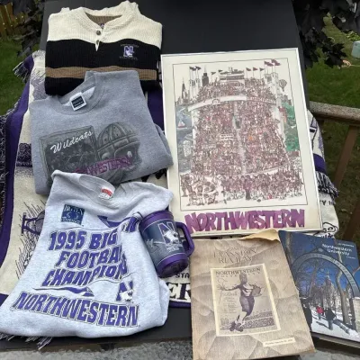 Northwestern lot: crewnecks, framed poster, books etc