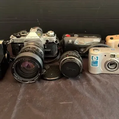 Cameras: Cannon AE-1 W/2 Lenses, 2 Instamatics, Digital Camera