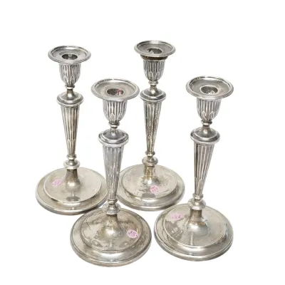Sale Photo Thumbnail #151: A SET OF FOUR GEORGE III STERLING CANDLESTICKS