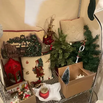 Christmas Decor With Miniature Trees, Pillows, Ornaments And Snowglobes