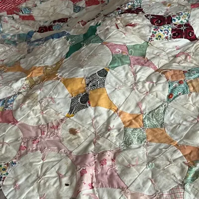 Vintage handmade cathedral window quilt 