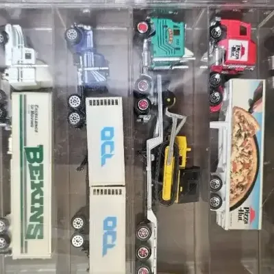 vintage collection of miniature die-cast semi-truck transporters and racing Haulers, 