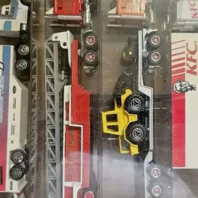 vintage collection of miniature die-cast semi-truck transporters and racing Haulers, 