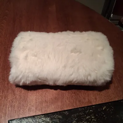 CEDAR BOX, LEATHER PURSE, PUZZLES AND 2 HAND MUFFS
