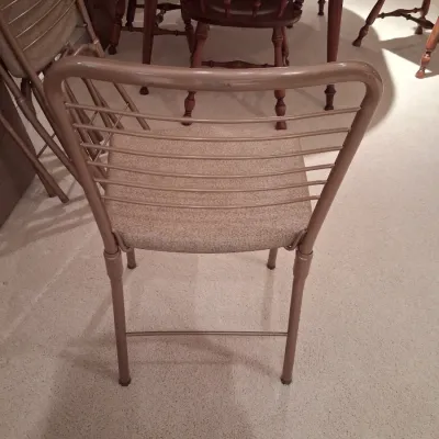 4 FOLDING CHAIRS AND A FOLDING CARD TABLE