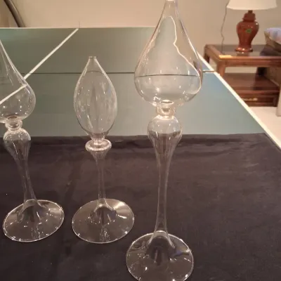 GLASS FLOATS IN A RUFFLED GLASS BOWL PLUS OIL CANDLE LAMPS