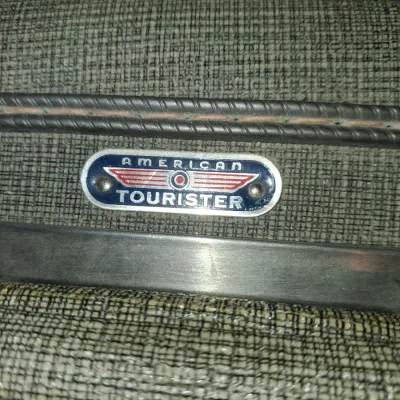 2 VINTAGE AMERICAN TOURISTER SUITCASES AND A GARMENT BAG