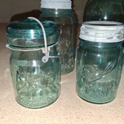 AQUA BLUE CANNING JARS WITH ZINC AND WIRE BALE LIDS