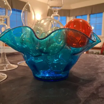 GLASS FLOATS IN A RUFFLED GLASS BOWL PLUS OIL CANDLE LAMPS