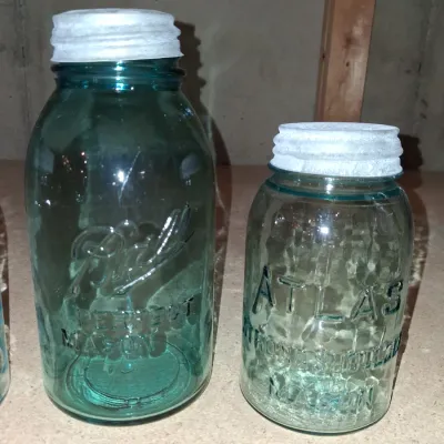 AQUA BLUE CANNING JARS WITH ZINC AND WIRE BALE LIDS