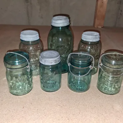 AQUA BLUE CANNING JARS WITH ZINC AND WIRE BALE LIDS