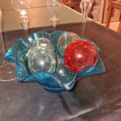 GLASS FLOATS IN A RUFFLED GLASS BOWL PLUS OIL CANDLE LAMPS